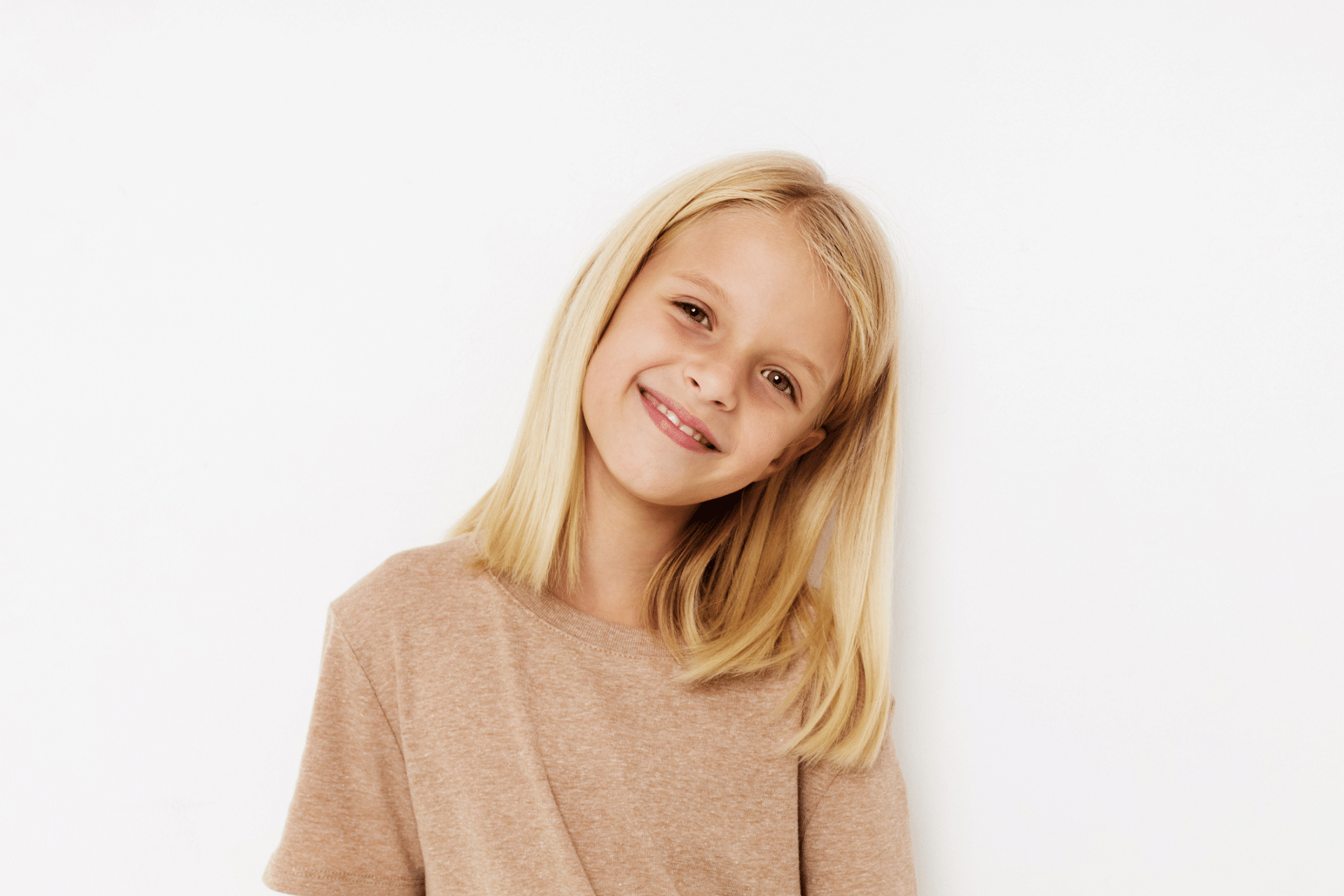 Child smiling before an early orthodontic evaluation in Bellevue, WA